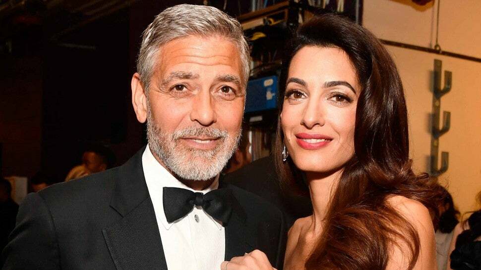 George Clooney says wife Amal is watching 'ER' and it's getting him into 'trouble'!!!