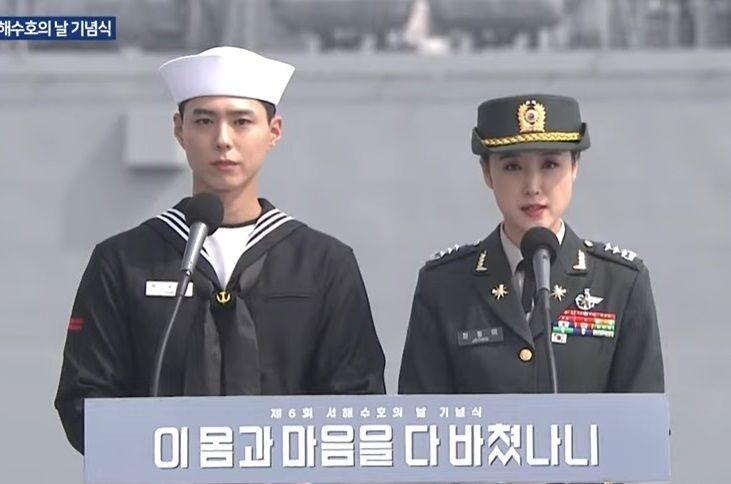 Park Bo-gum (left) appears as an event host for West Sea Defense Day ceremony on March 26.