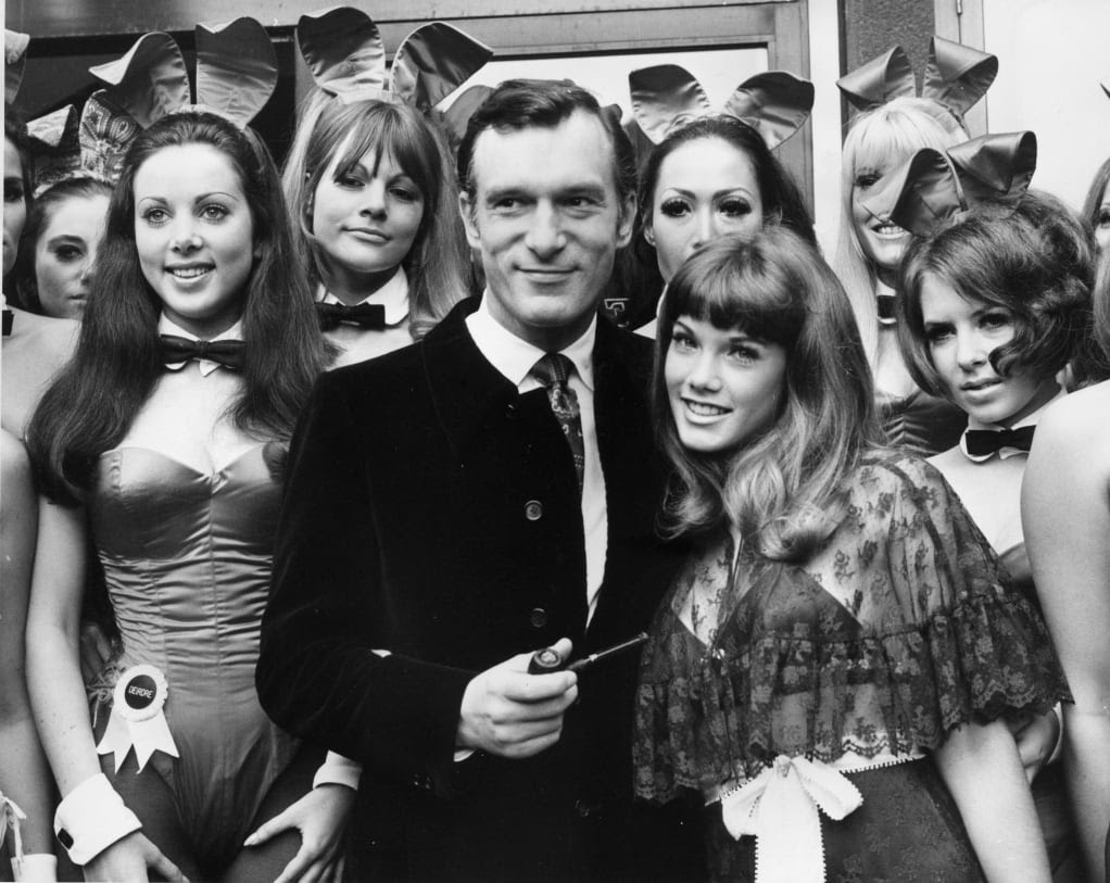 Hugh Hefner with models 