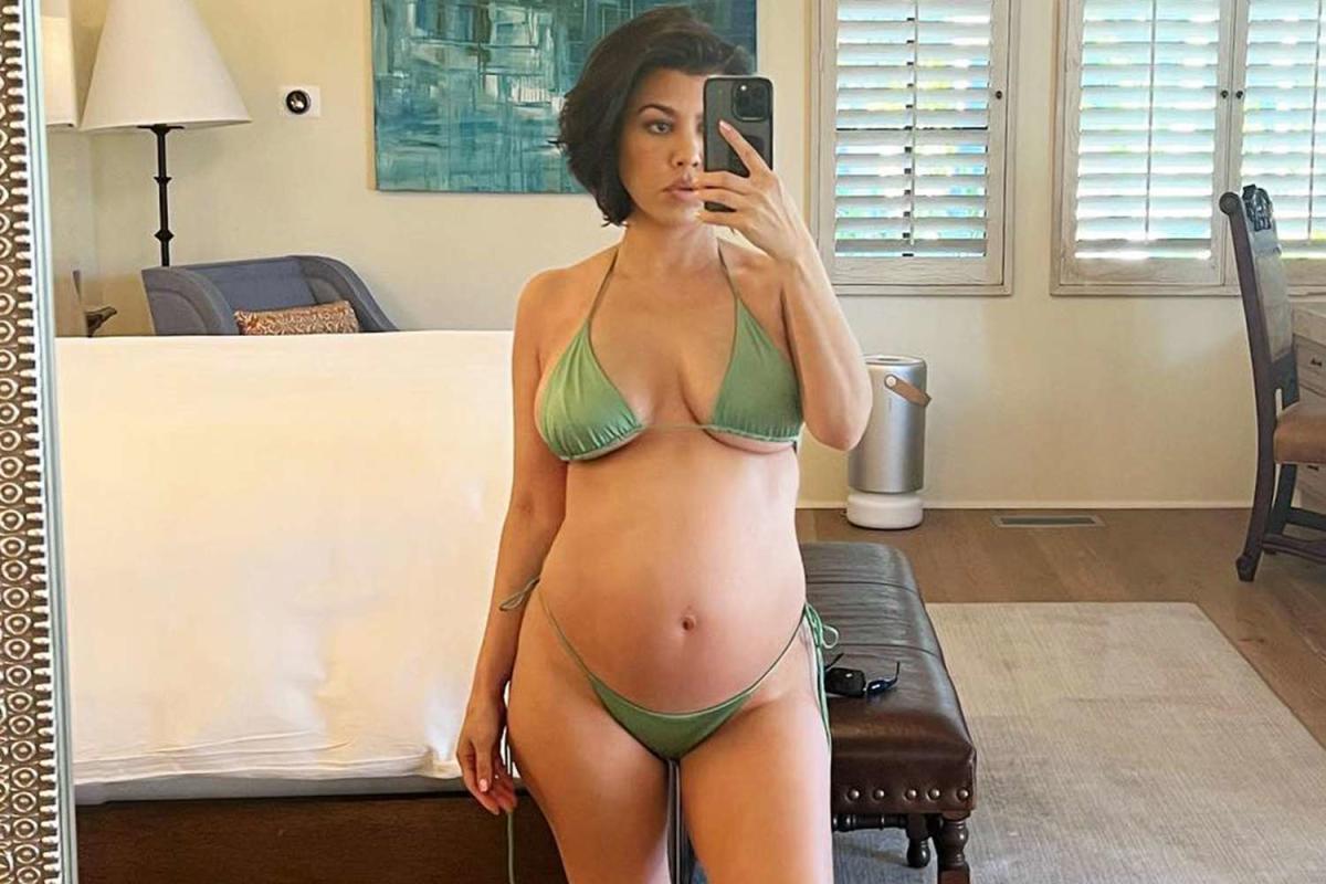 Pregnant Kourtney Kardashian Shows Off Her Baby Bump in Striking Photos 18